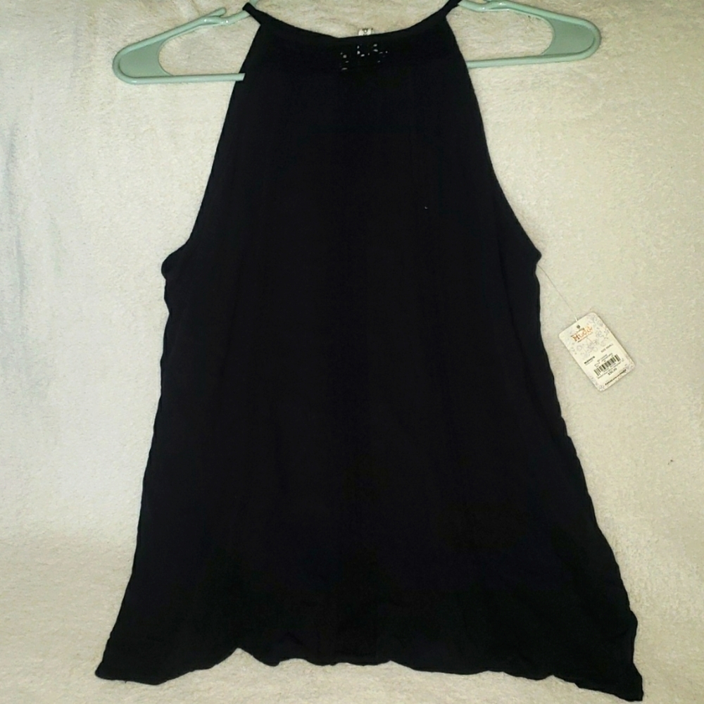 Black women's shirt size small made by Mudd.